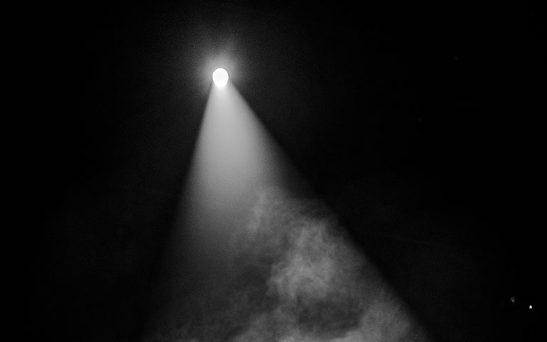 Image of a spotlight in a concert